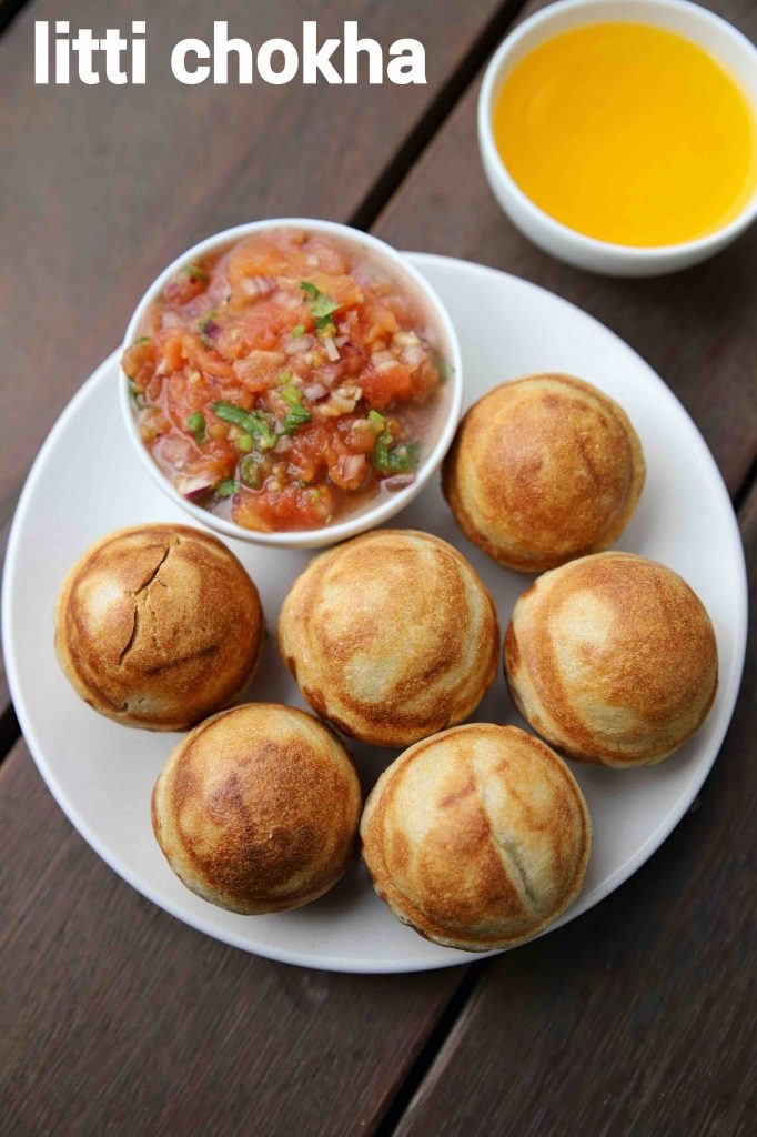 Litti Chokha can be considered as the dish of Bihar. It was started as a meal of poor and then was sold on carts on the street Chokha is prepared by mashing boiled vegetables ,adding spices and chopped onion, garlic etc and served with Litti as a complimentary delicacy.