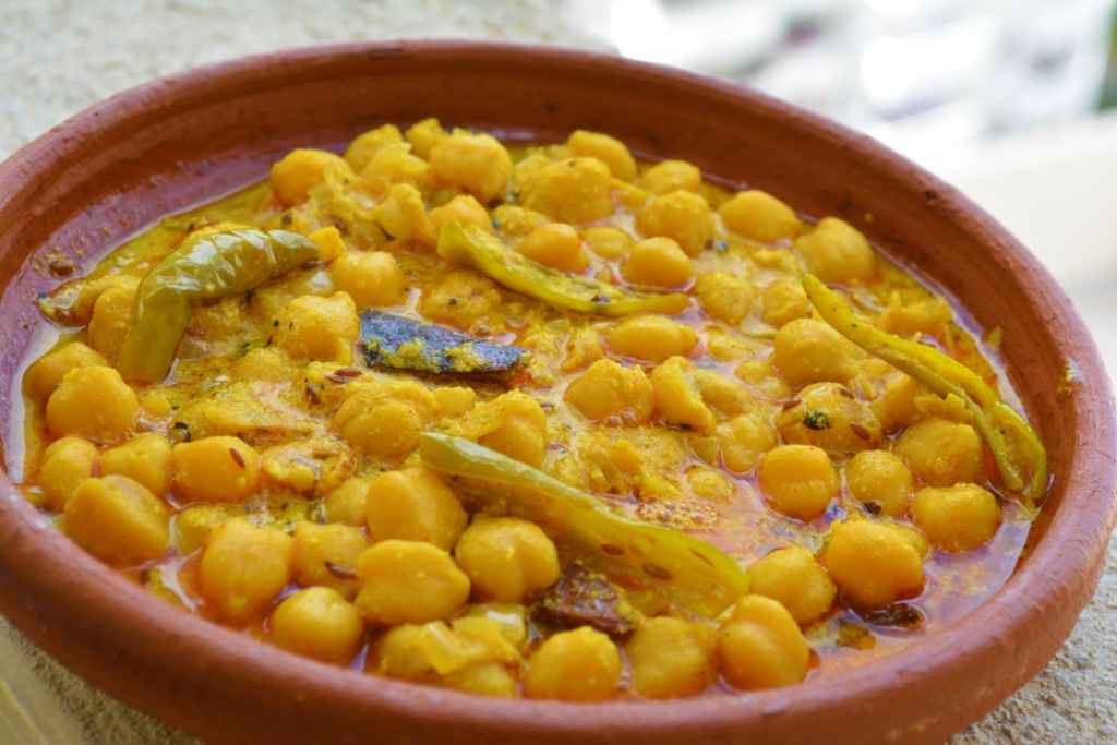 Madra is a delicacy that belongs to Chamba district of Himachal Pradesh. This dish consists of the soaked chickpeas or vegetables. Madra is one of those dishes that represents the food culture of Himachal Pradesh and is available at every restaurant, and on festivals, offered to you with utmost love. 