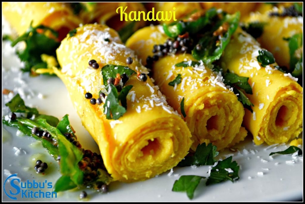 Khandvi consists of yellowish, tightly rolled bite-sized pieces and is primarily made of gram flour and yogurt. Khandvi is readily available across India and is commonly eaten as an appetizer or snack and is served with garlic chutney.